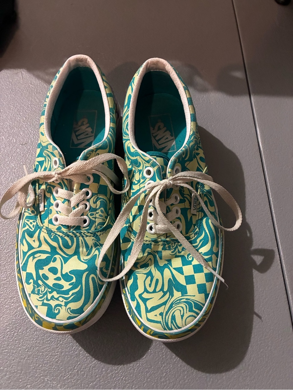 Vans woman’s Teal & Yellow Swirl Checkerboard Canvas Sneakers